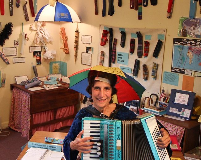 Umbrella Cover Sleeves - Nancy Hoffman from Peaks Island, Maine owns the largest umbrella cover collection with 730 unique items. You can visit the museum she set up on the island and sing along to official song while she plays the accordion.