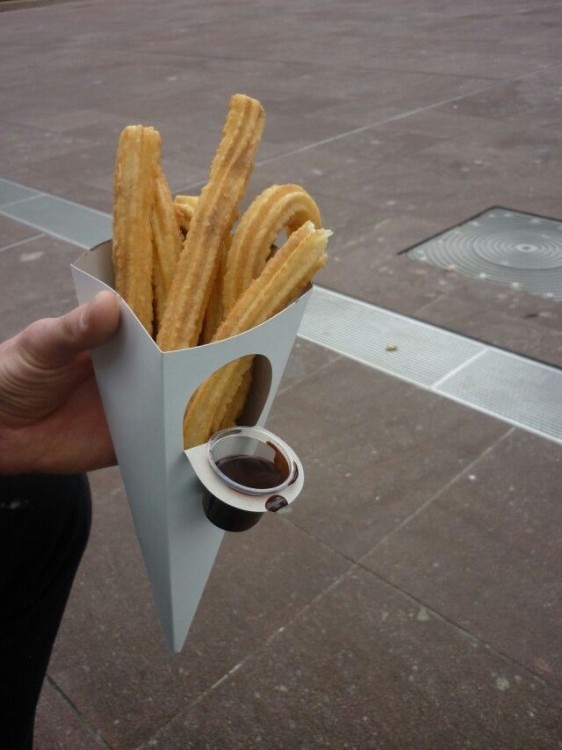 Churros with a caramel dipping holder