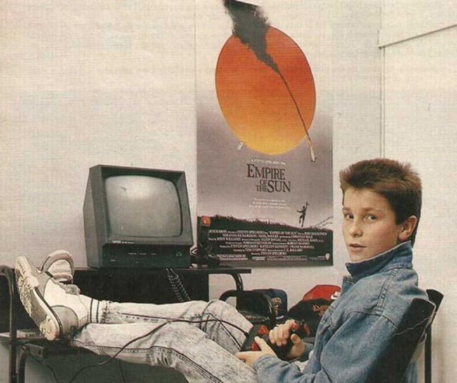 Christian Bale playing with his Amstrad computer. [c. 1984]