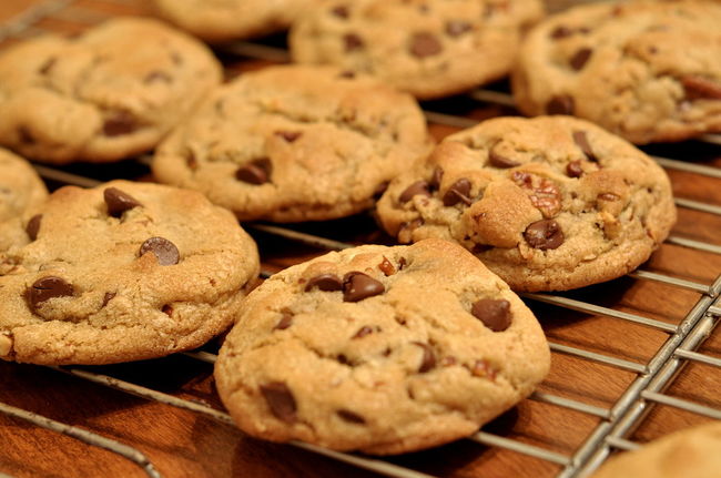 Chocolate Chip Cookies-In 1930, Ruth Wakefield, owner of the Toll House Inn, just wanted to make some chocolate cookies, but discovered she was out of baker’s chocolate. As a substitute she broke sweetened Nestle chocolate into small pieces and added them to the cookie dough.she called them “Toll House Crunch Cookies” and they became extremely popular locally. Because her cookies increased sales in Nestle’s semi-sweet chocolate bars, Andrew Nestle and Wakefield came to an agreement that they would print the recipe on it’s package and she would be given a lifetime supply of Nestle chocolate.