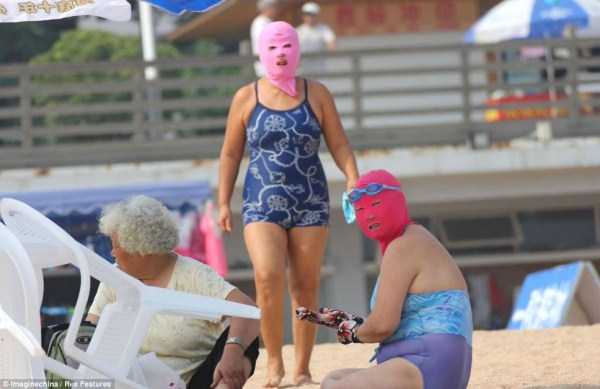 Beachgoers In China Have A New Sun Protection Strategy