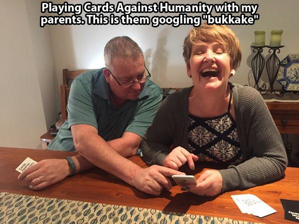 playing cards against humanity with parents - Playing Cards Against Humanity with my parents. This is them googling"bukkake"