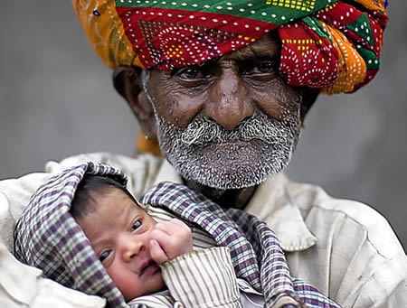 The world's oldest father has done it again, fathering a child for at least the 21st time, at the age of 90. Indian farmer Nanu Ram Jogi, who is married to his fourth wife, boasts he does not want to stop, and plans to continue producing children until he is 100.