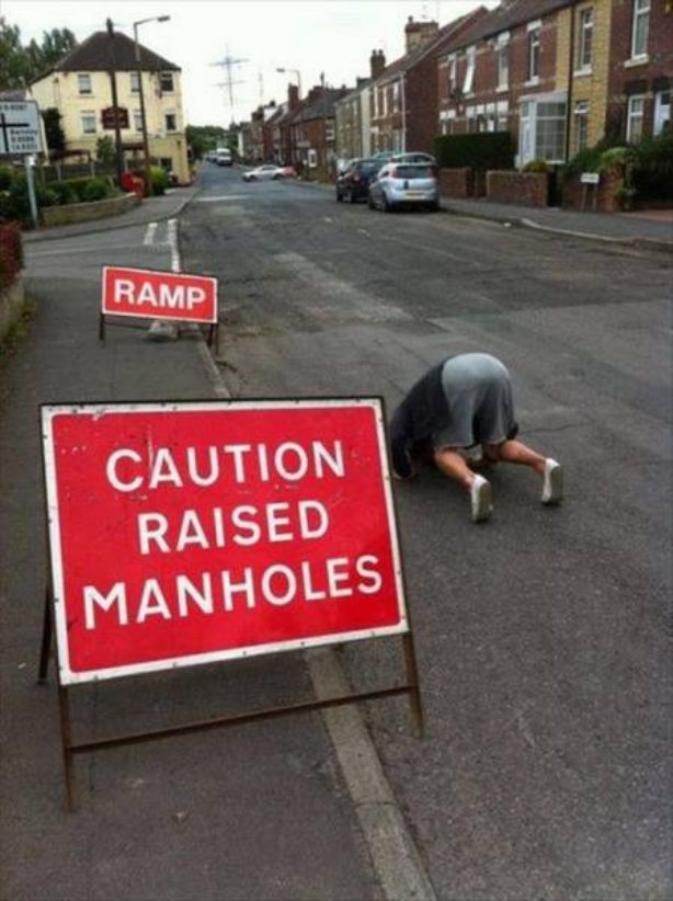 funny we re moving - Ramp Caution Raised Manholes