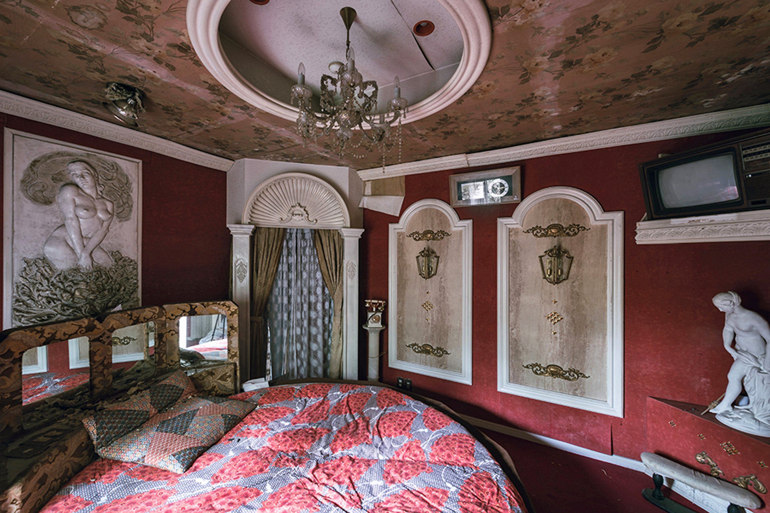 Pictured, one of the suites is decorated to look like a Classical Greek room.