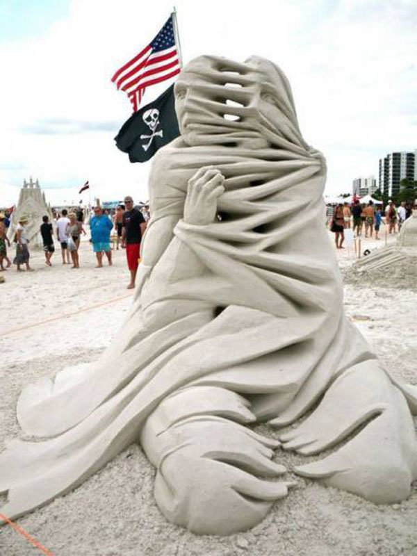 sand sculpture person