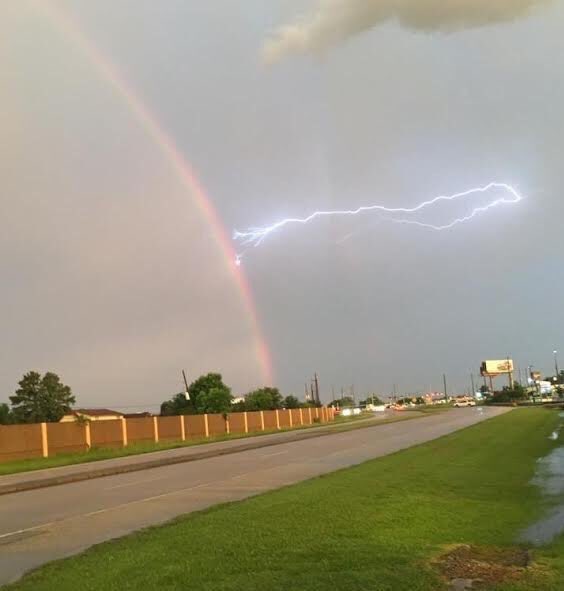 lightning strikes rainbow