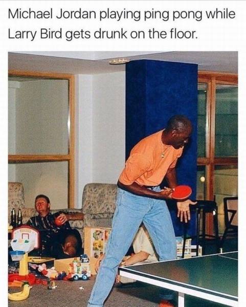 michael jordan ping pong larry bird - Michael Jordan playing ping pong while Larry Bird gets drunk on the floor.