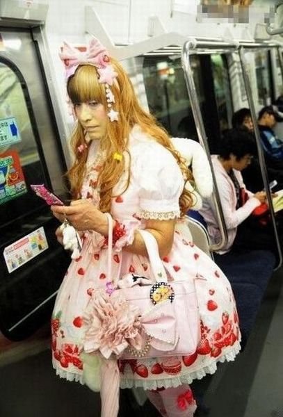 Woman dressed like hello kitty on the subway