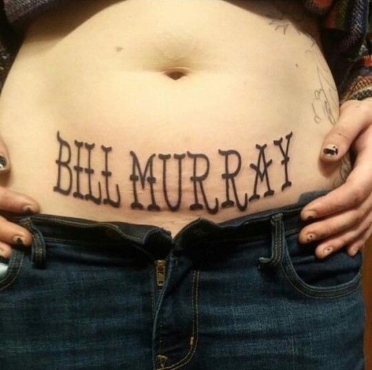 Someone got a tattoo of Bill Murray on their lower torso.