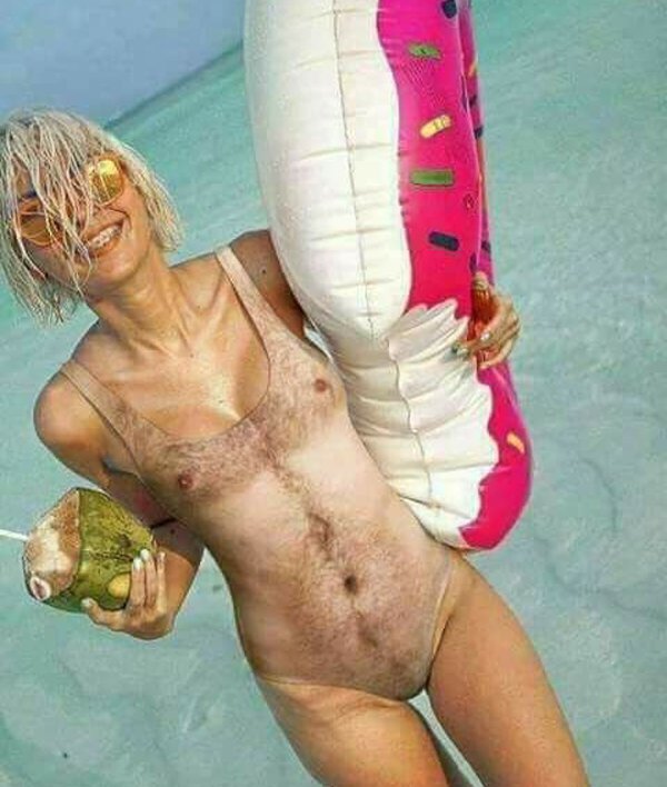 woman wearing a bathing suit that looks like a hairy man chest.