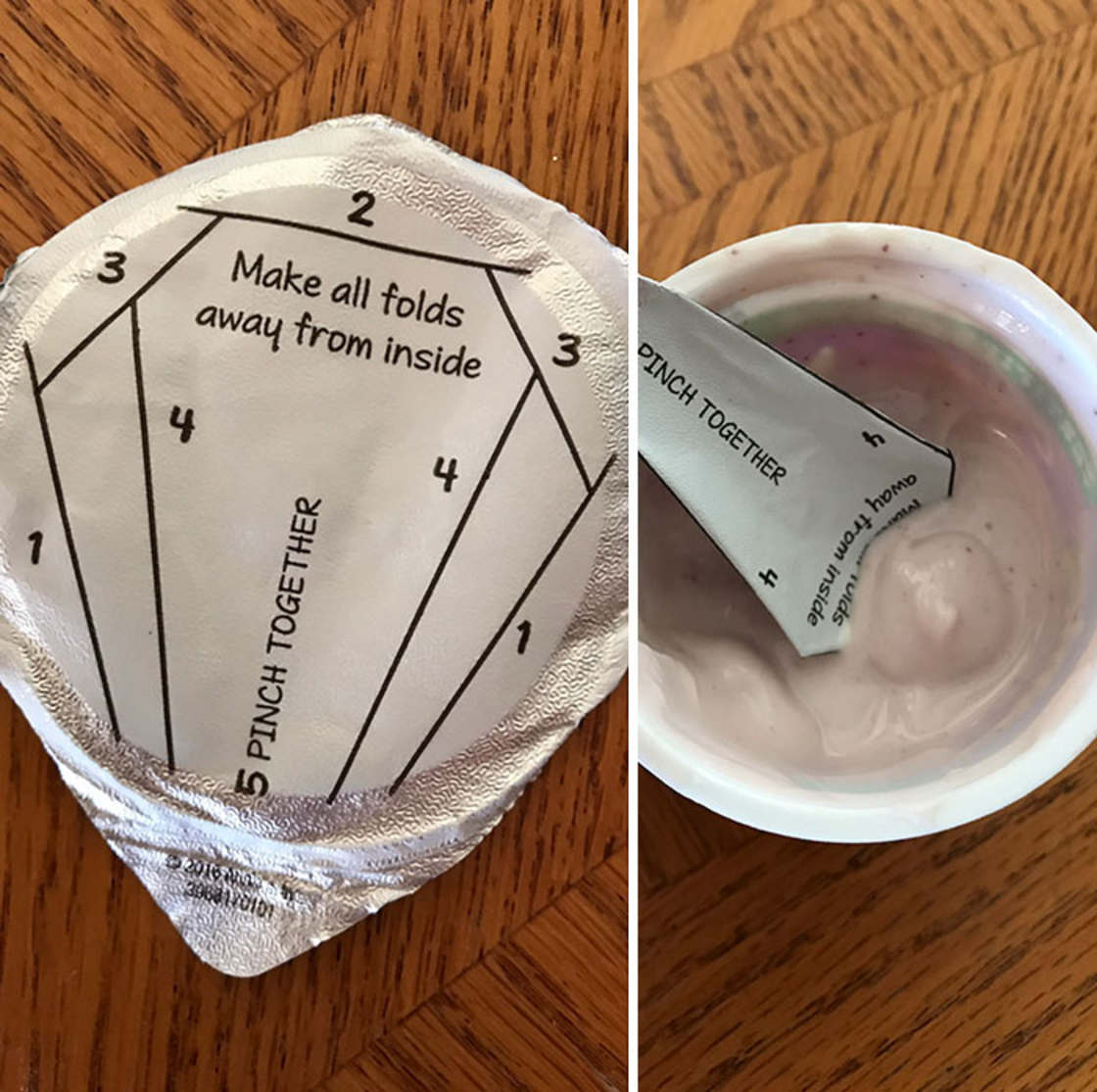 Yogurt with instuctions on the metal lid on how to use it as a spoon by folding it.