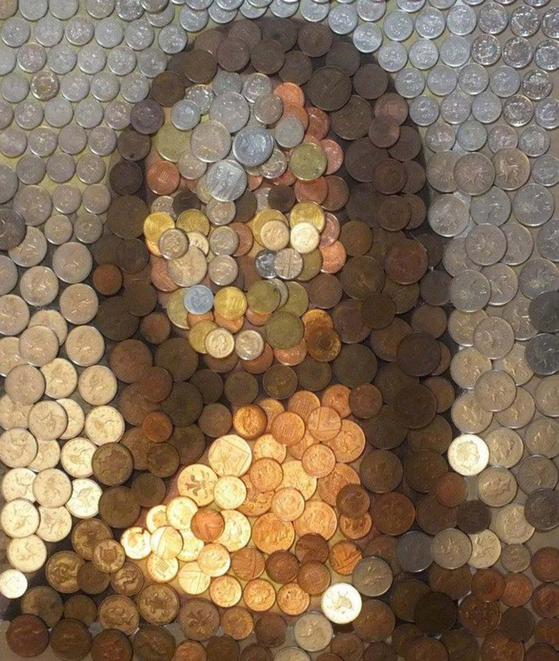 Bunch of coins that look very much like the Mona Lisa.