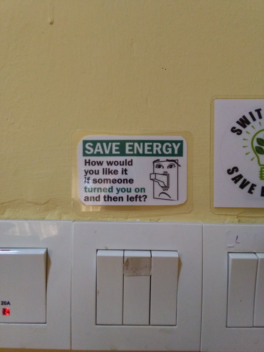 Sign asking to save energy has some cheeky comments about remember to do so.
