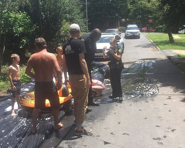 Cops in Asheville, North Carolina, responded to a complaint about a giant slip-and-slide that had been set up for a Fourth of July block party. They had received a complaint from one of the neighbors that the DIY water slide was blocking the road