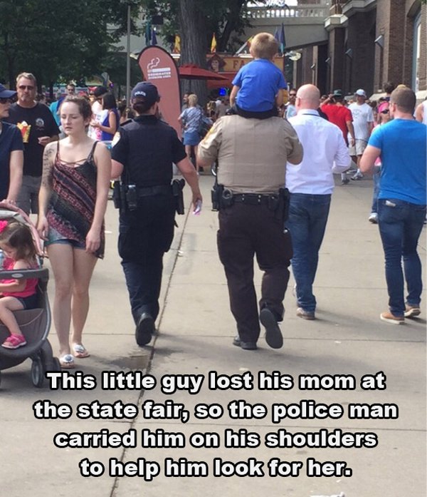 Police - This little guy lost his mom at the state fair, so the police man carried him on his shoulders to help him look for her.