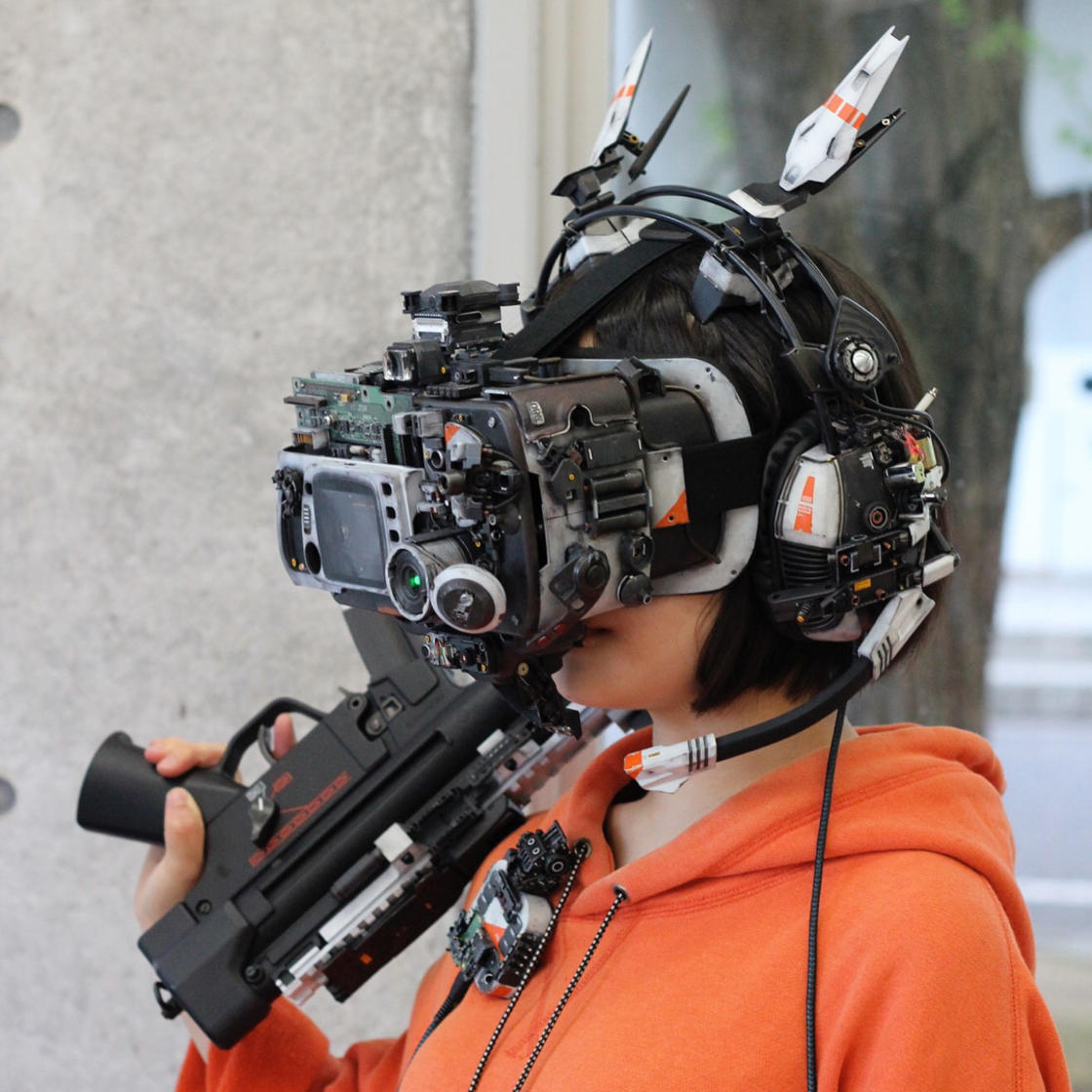 Woman wearing a very elaborate VR rig