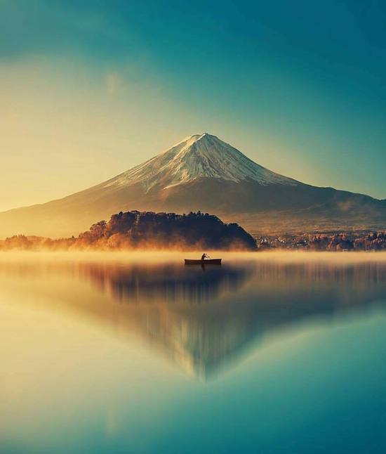 Amazing photo of calm water with glorious mountain in the background.