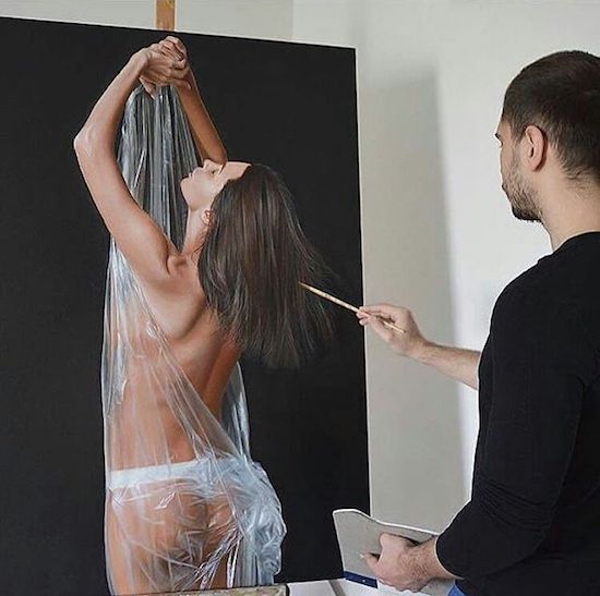 Man painting amazingly real woman in plastic.