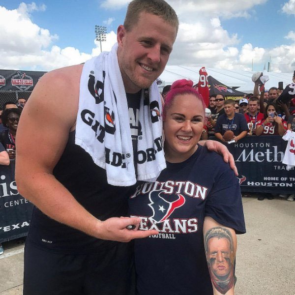 Woman with sports hero tattoo has pic with her sports hero