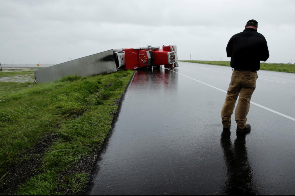 Truck overturned on highway from Hurricane Harvey
