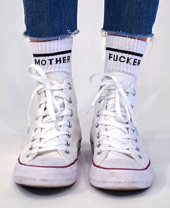 Nerdy shoes with socks that say Mother Fucker