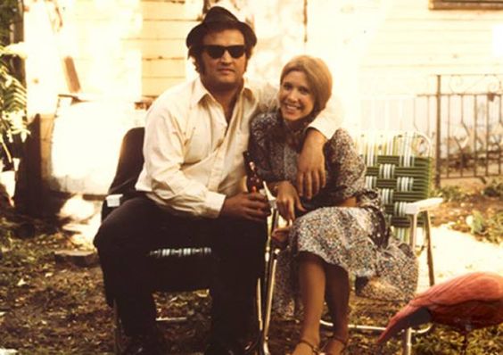 Carrie Fisher and John Belushi on the set of The Blues Brothers