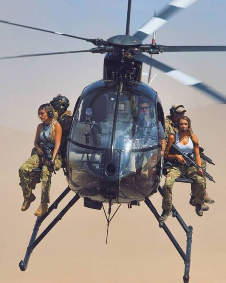 girls guns helicopter