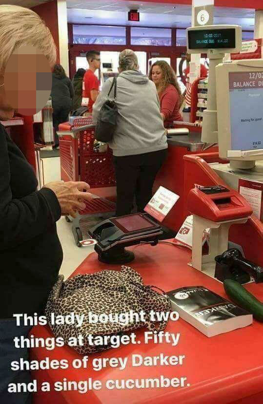 random pic lady with fifty shades of gray - 12022017 120 Balance De 3 This lady bought two things at target. Fifty shades of grey Darker and a single cucumber.