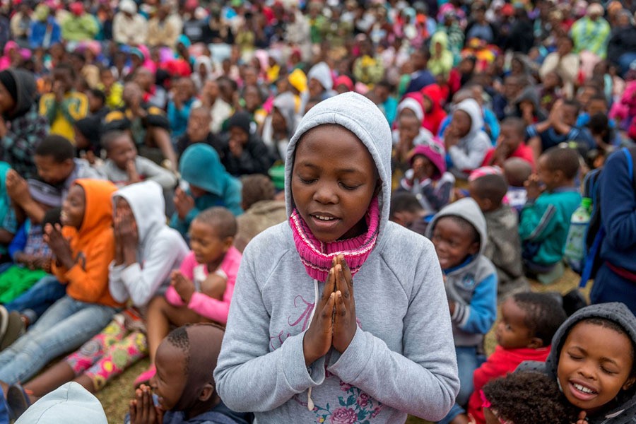 Close to 2,000 people take part in the "I Meditate" Africa Month Program in Richmond, South Africa, on May 27, 2017. "I Meditate" is a volunteer-based nonprofit organization devoted to teaching meditation as part of self discipline and peace building, especially in prisons, schools, educational and social institutions, and in highly stressful environments. The town of Richmond was once a hotbed of political violence between the African National Congress and the United Democratic Movement. The Art Of Living Foundation conducted the program in 25 African countries, reaching over a million people.