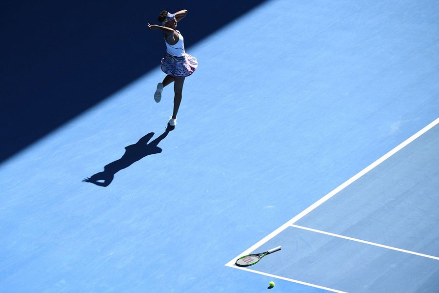 Venus Williams celebrates her victory against Coco Vandeweghe during the women's singles semi-final match on Day 11 of the Australian Open tennis tournament in Melbourne on January 26, 2017.