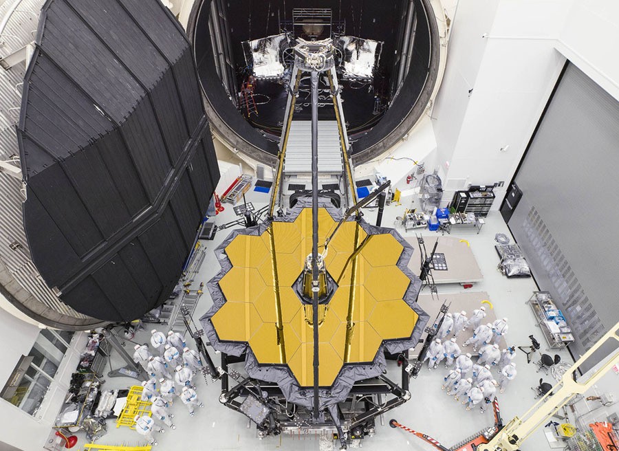 Engineers pose with NASA’s James Webb Space Telescope, after it emerged from Chamber A, a huge thermal vacuum testing chamber, after about 100 days of cryogenic testing, at NASA’s Johnson Space Center in Houston, Texas, on December 1, 2017. The telescope is seen as the successor to the Hubble Space telescope, and is currently scheduled to launch in the Spring of 2019. — Maybe my favorite tweet from 2017 came from NASA engineer Bobak Ferdowsi. He was talking to his father about being happy with his work at NASA, and his father said "The world is ending. I’m sure the band enjoyed playing on the Titanic as it sank." Bobak's tweet: "Working on space requires the constant optimism that the world will still exist when you launch in the 2020s."