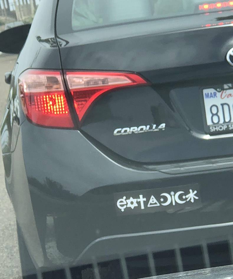 car with coexistence sticker but upon closer inspection reads Got Dick