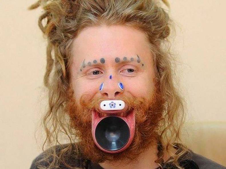 man with crazy piercings