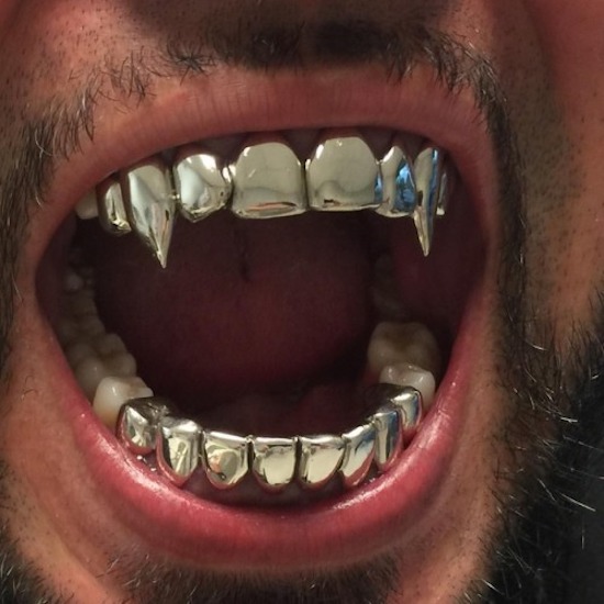 dental work with chrome fangs