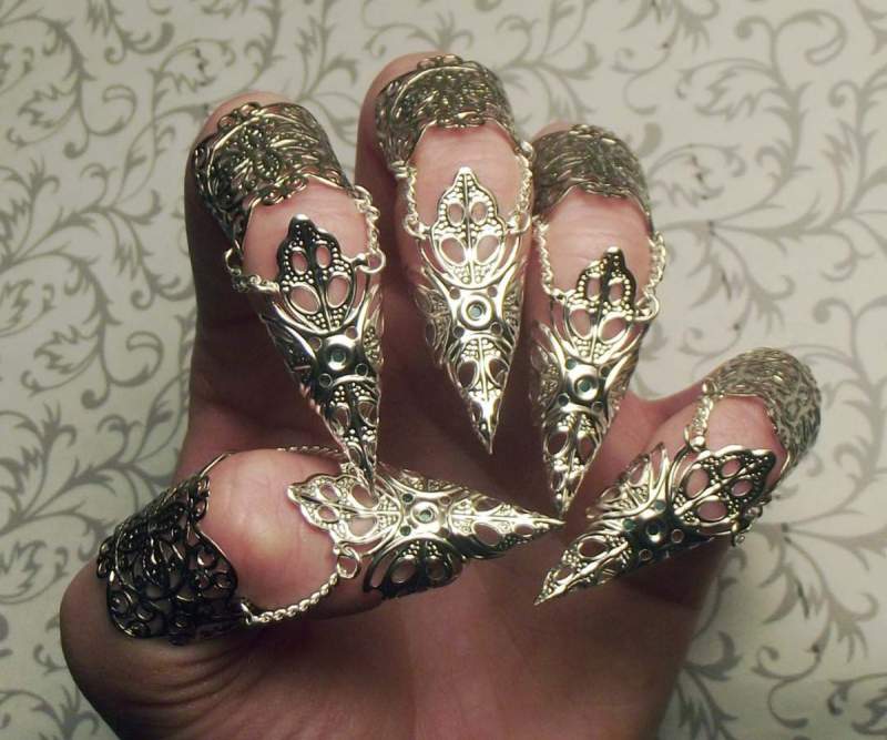 gold covered finger nails