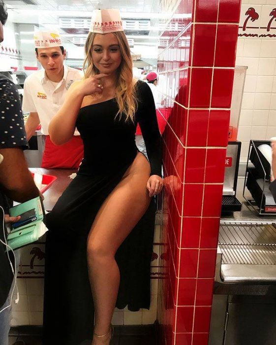 girl showing some leg at a fast food place