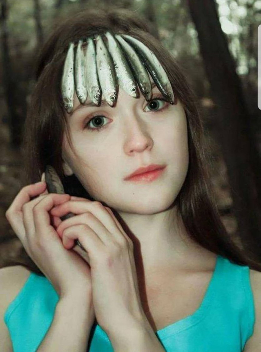 girl wearing fish hair