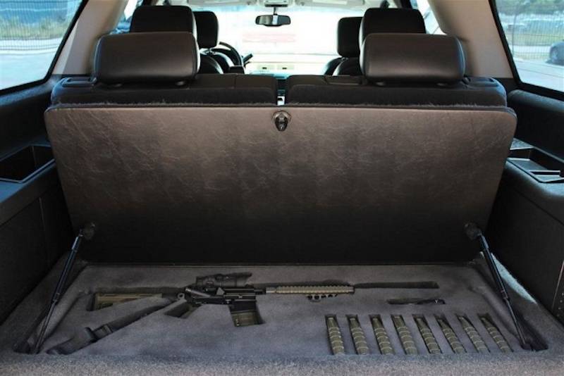 random pic hidden gun compartment in car