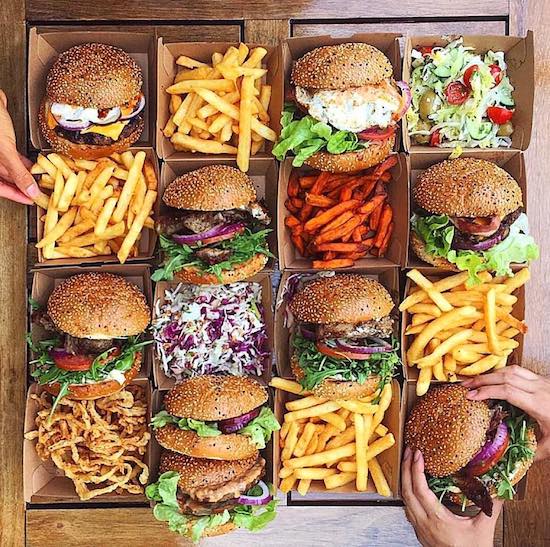 beautiful spread of burgers and fries