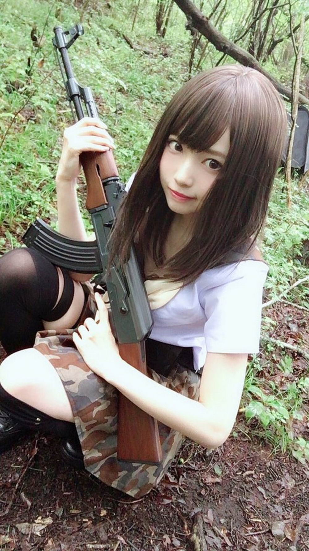 cute asian girl with guns