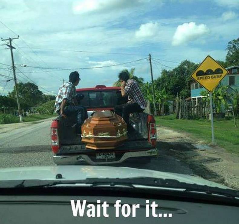 coffin in pickup truck - Speed Bump Wait for it...