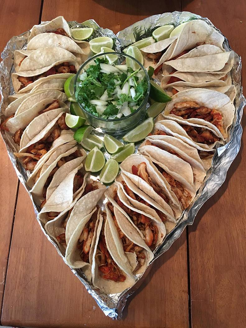- platter of tacos in a heart shape