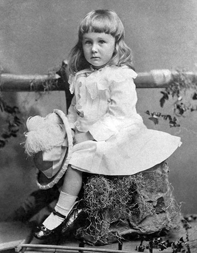 Beautiful little girl posing for a photo? Would later become the president of the United States of America
   Well, you just got trapped. That's Franklin D. Roosevelt, photo taken at the age of 2 1/2. In those times, boys at the age of 6 or 7 would wear dresses. This dress was considered gender neutral.