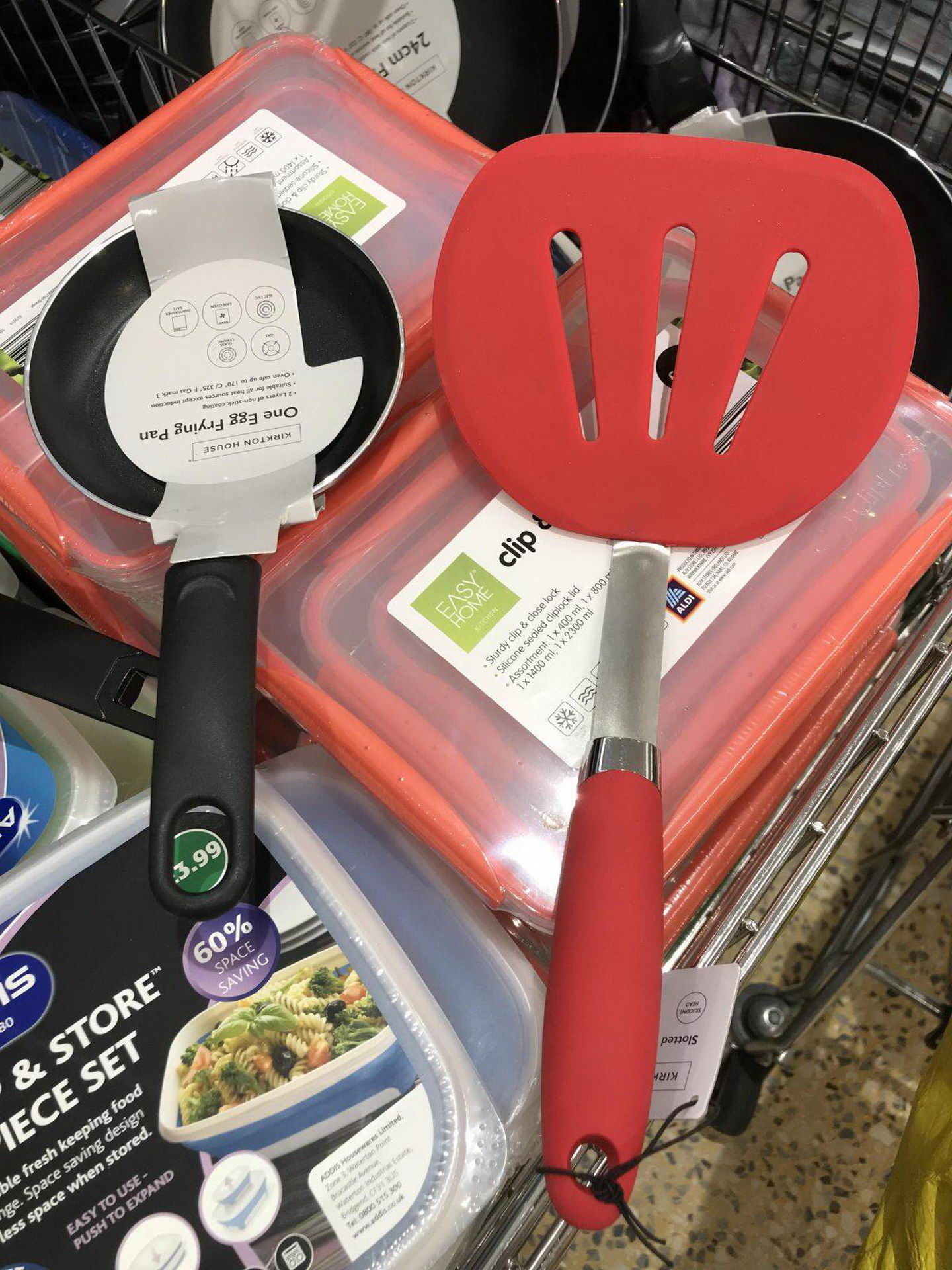 remarkable image of a small one egg frying pan next to a large spatula