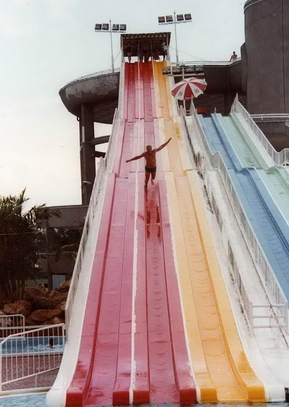 remarkable image of a man falling down a water slide