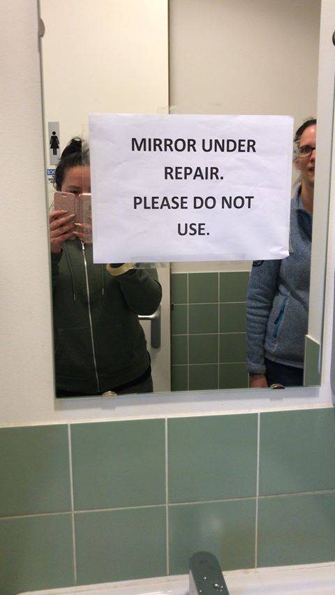 room - Mirror Under Repair. Please Do Not Use.
