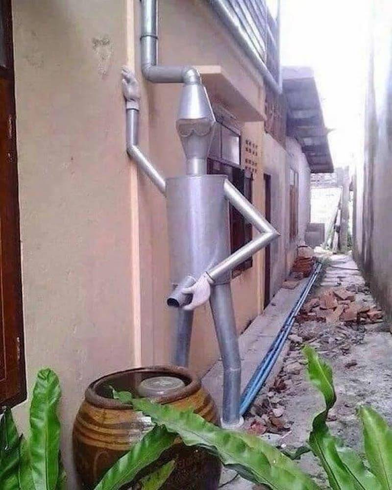 downspout man peeing