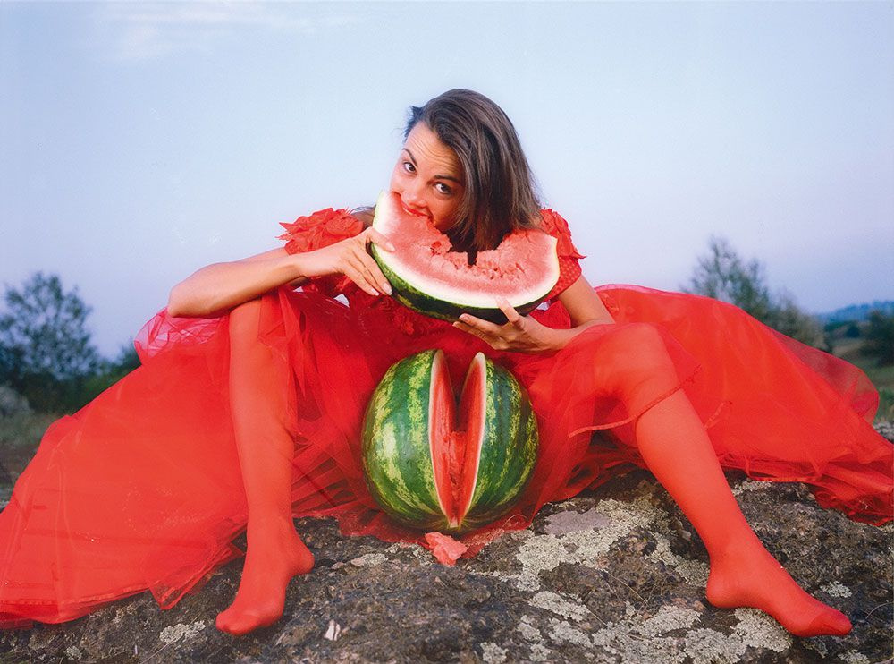 woman eating a watermelon