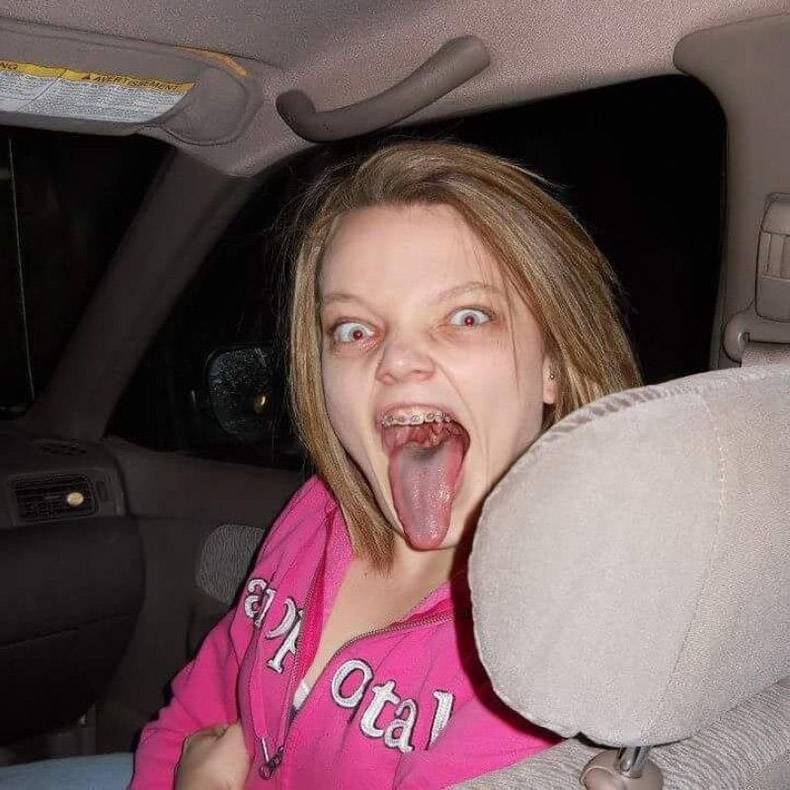 creepy pic of a girl sticking out her tongue